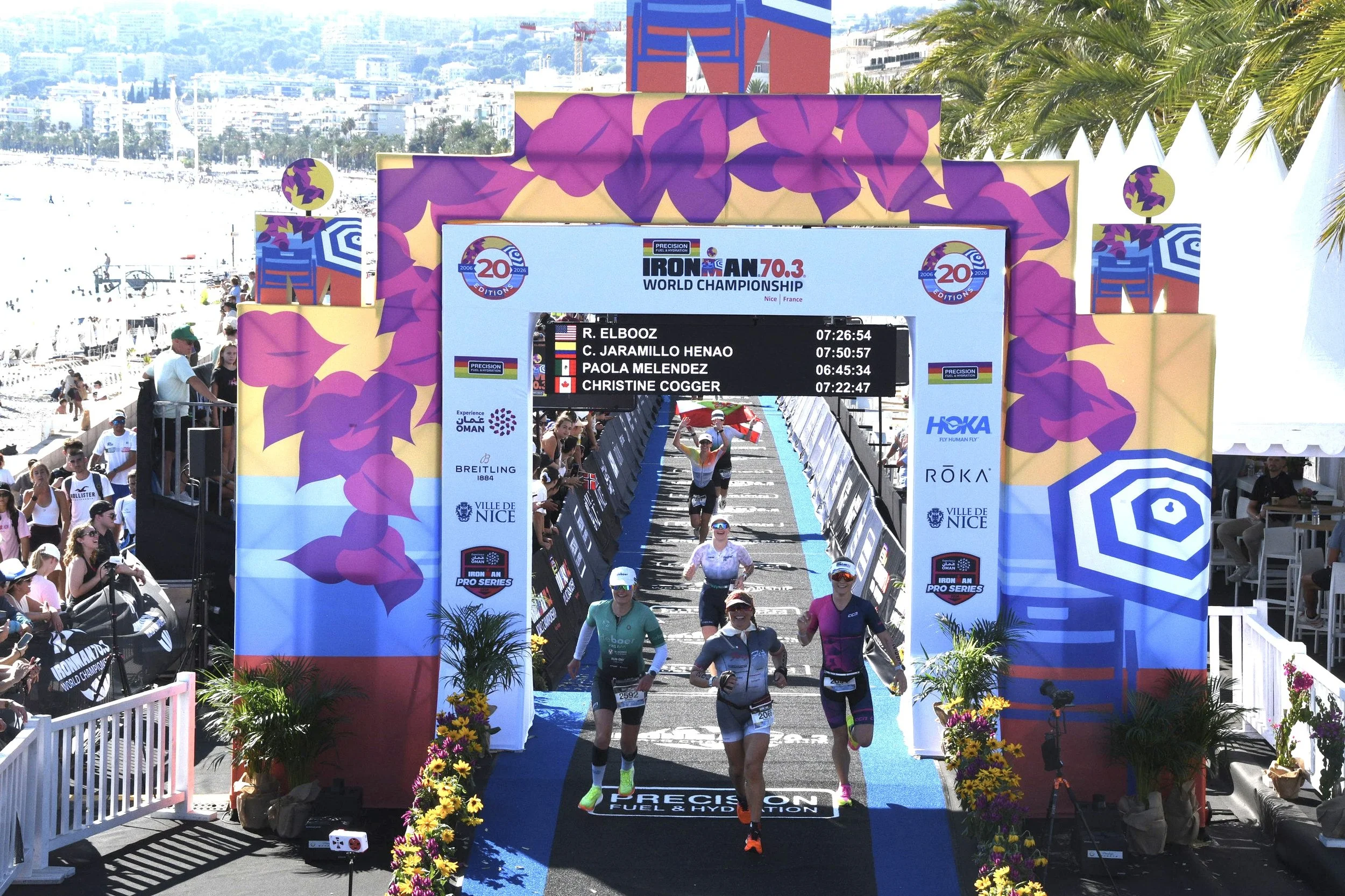 Rosa Laura Elbooz running through the finish arch at the 2026 IRONMAN 70.3 World Championship in Nice, France.
