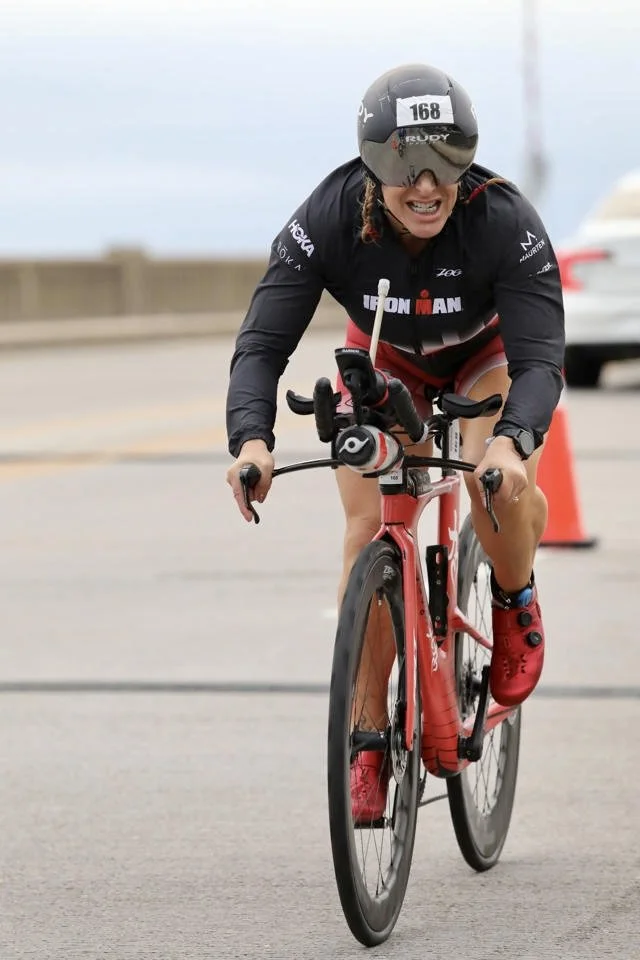 ForzaFit coach Rosa Laura battling strong headwinds during the cycling portion of IRONMAN 70.3 North Carolina 2026.