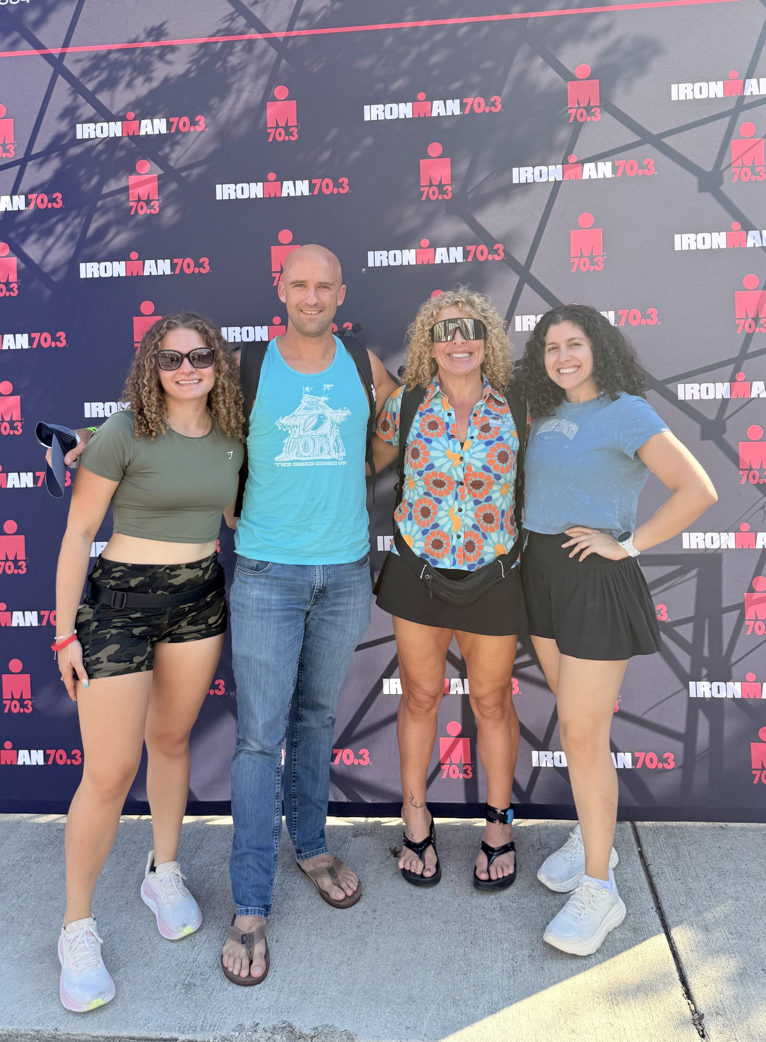 ForzaFit coach Rosa Laura with daughters Asia and Alessia and fellow athlete Sean at IRONMAN 70.3 North Carolina 2026 in Wilmington.