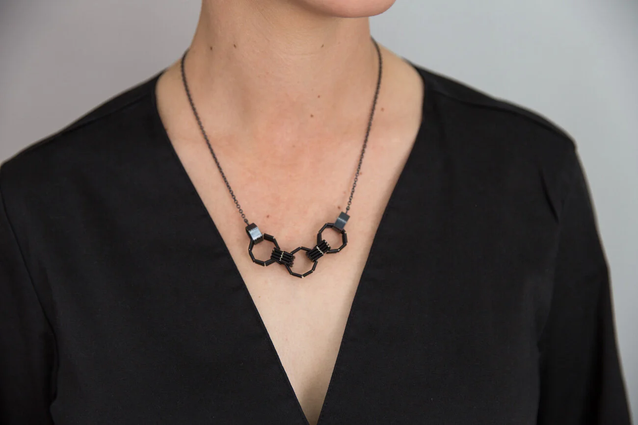 raissa-bump-links-hexagon-octagon-pendant-black.jpg
