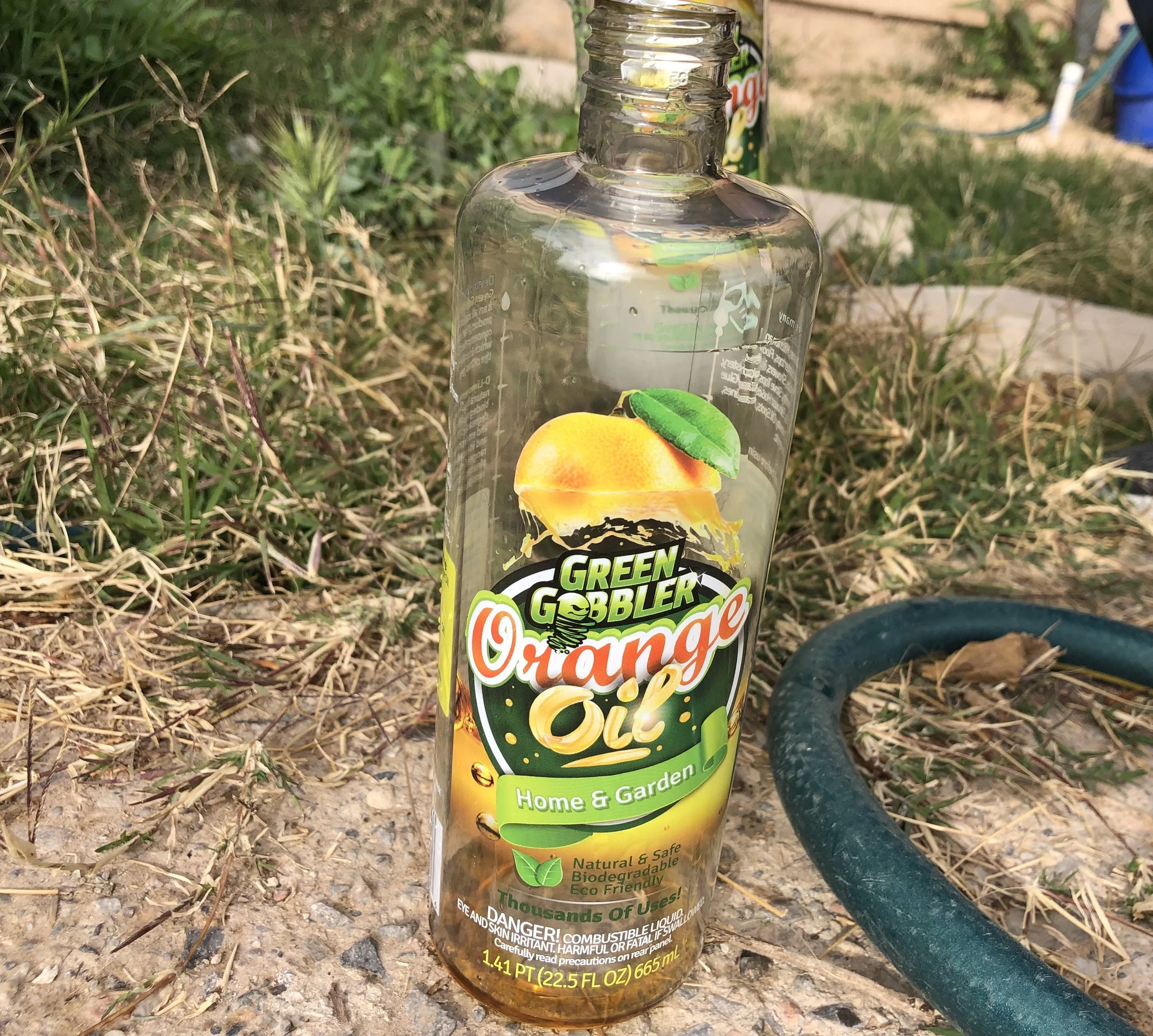 Concentrated orange oil was added to a 1-gallon plastic tank sprayer.