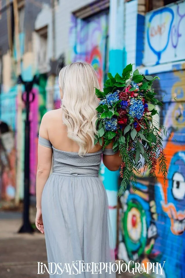 Couple with bouquet and boutonniere