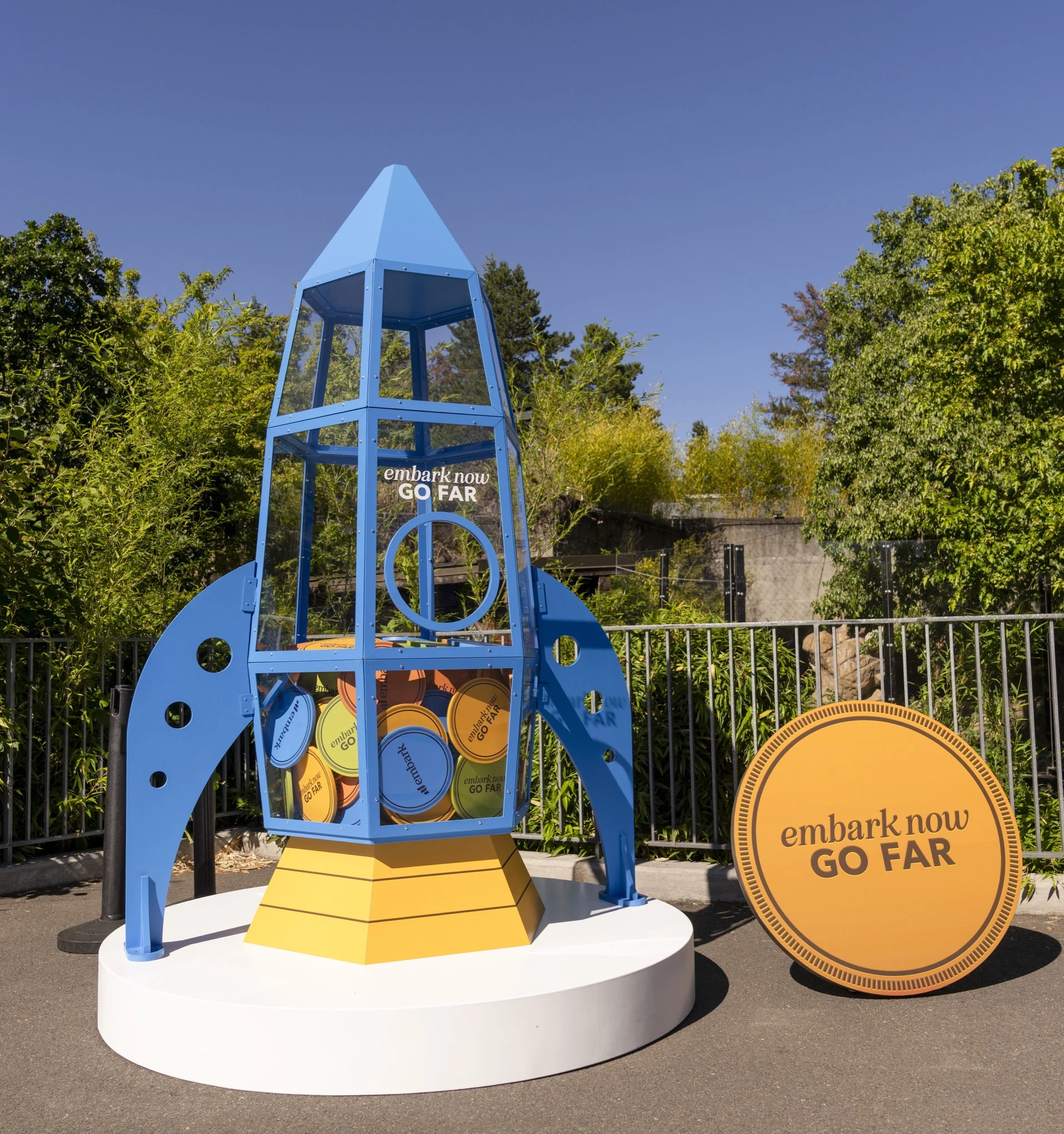 The Embark Now, Go Far rocket-shaped piggy bank at the Oregon Zoo.