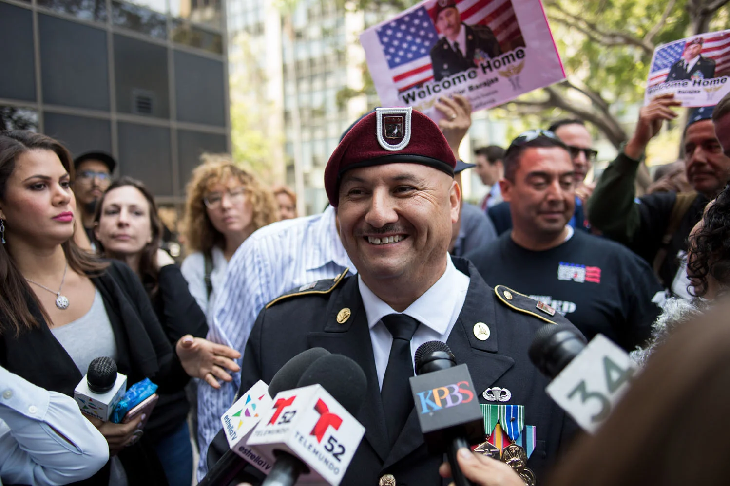 Spc. Hector Barajas speaks with the media after taking the oath as a U.S. Citizen.