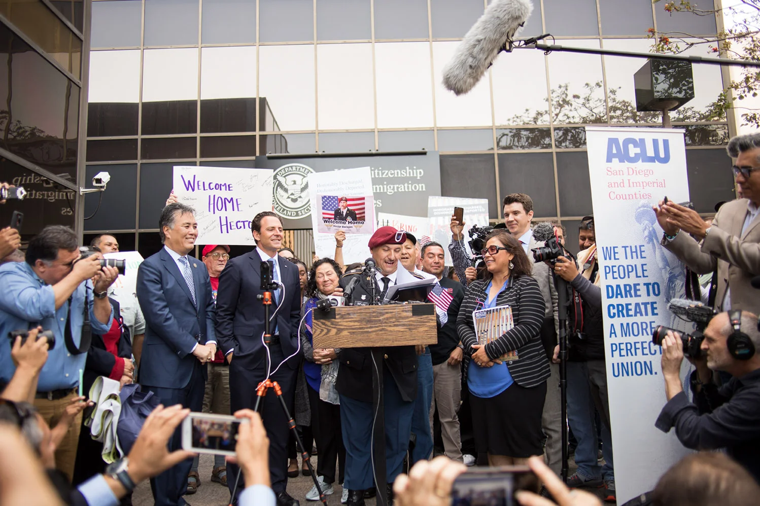 Sps. Hector Barajas speaks with the media after taking the oath as a U.S. Citizen. Left: Congressman Ted Leiu, CA State Assemblyman Nathan Fletcher Right: Executive Director of the American Civil Liberties Union of San Diego Norma Chavez-Peterson.