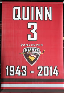 A banner in tribute to Pat Quinn