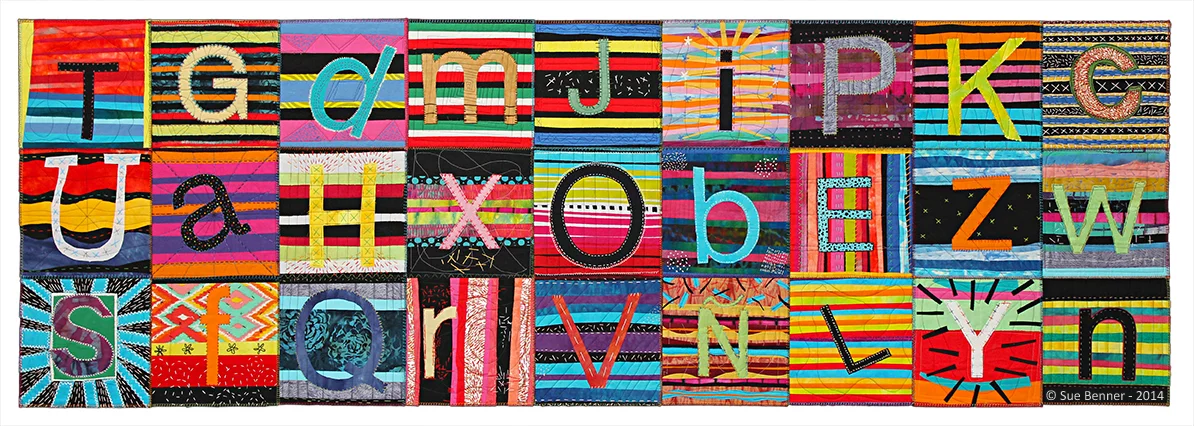 Avance Center Letter Quilt (Serape) Composed of collaged cotton and silk, machine and hand stitched, 31” H x 92” W. Created as a service learning project for AVANCE WACO by Students in the Medical Humanities 3300 Class, att Baylor University, Waco, Texas, Spring 2014. Art Faculty: Mary Ruth Smith, MFA, PhD and Leah Force, BFA, MFA, under the direction of Linda Bostwick, BSN, MN, FNP