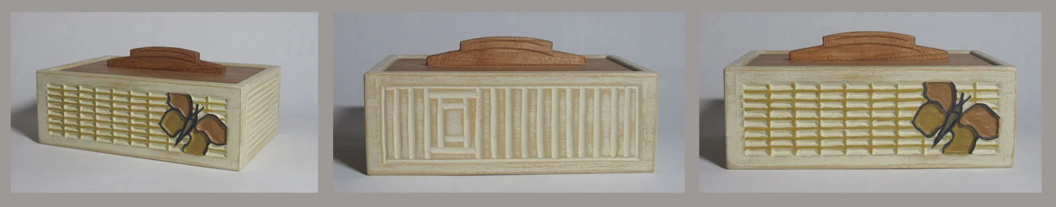 Basswood box with carving and a cherry drop-in lid