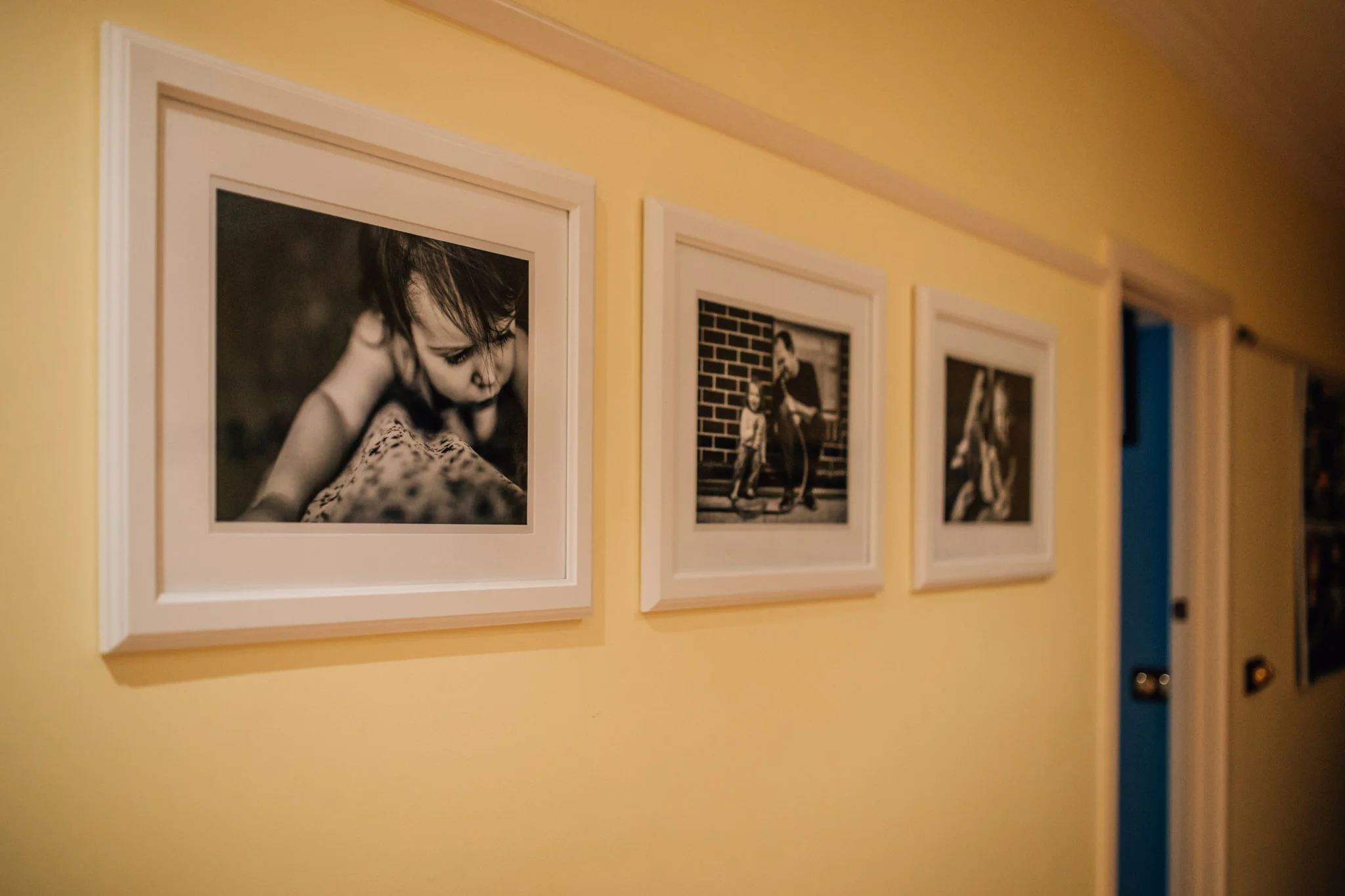 Here's one of our black and white wall galleries, located in our kitchen space.