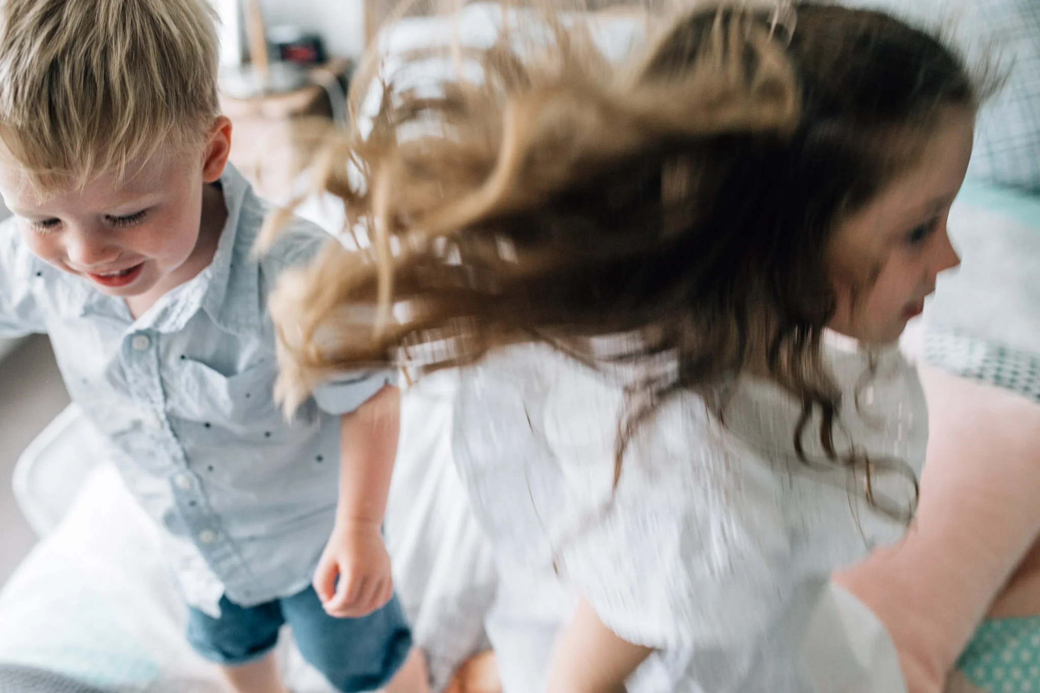 children-jumping-on-bed (1 of 1).jpg