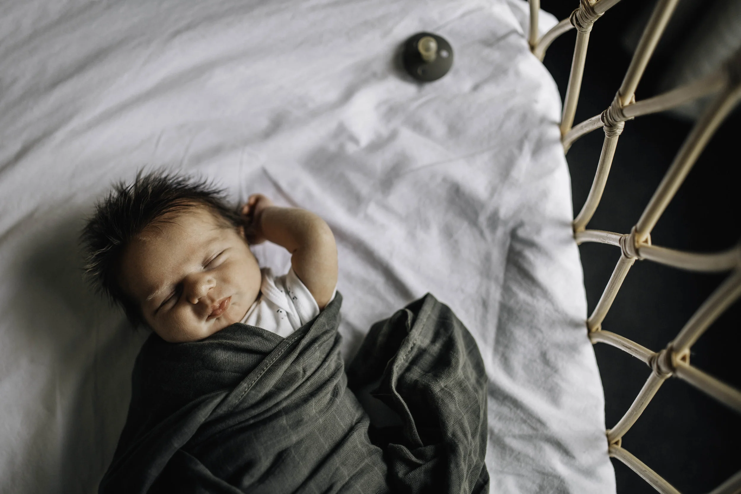 sleeping-baby-whicker-crib.jpg