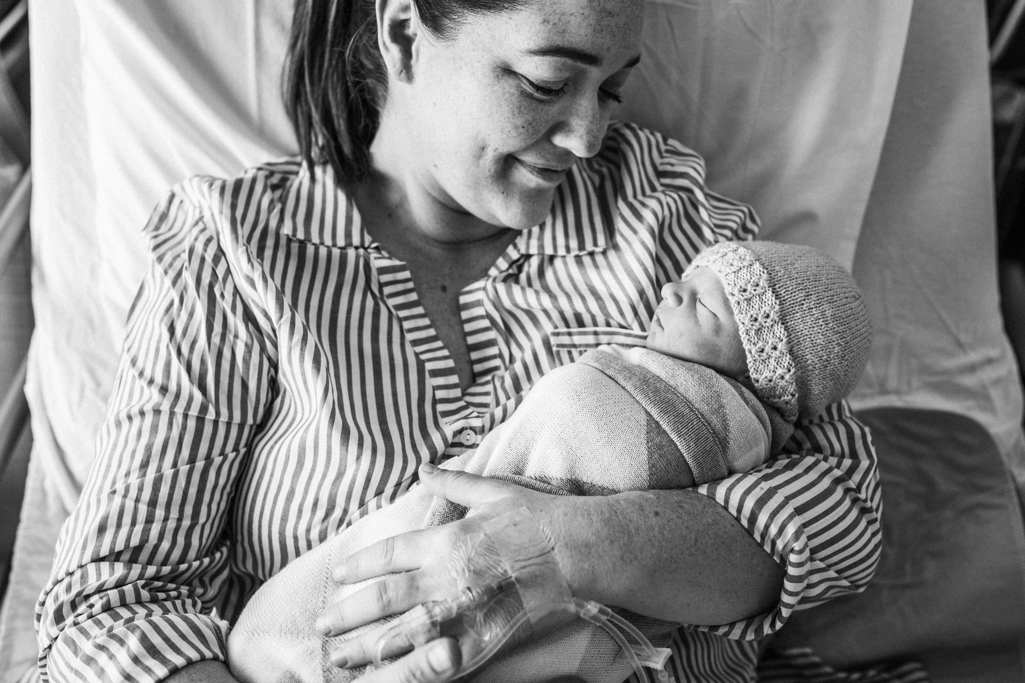 mother-smiling-with-infant (1 of 1).jpg