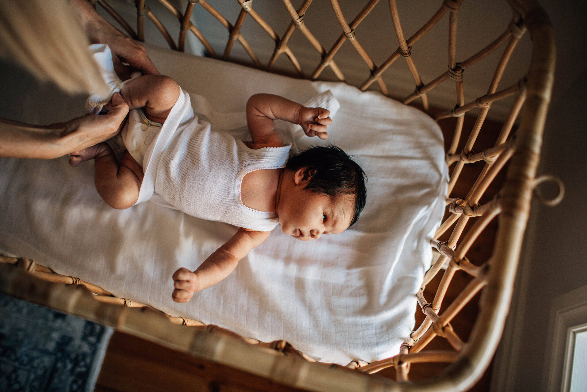 mother-dressing-infant.jpg