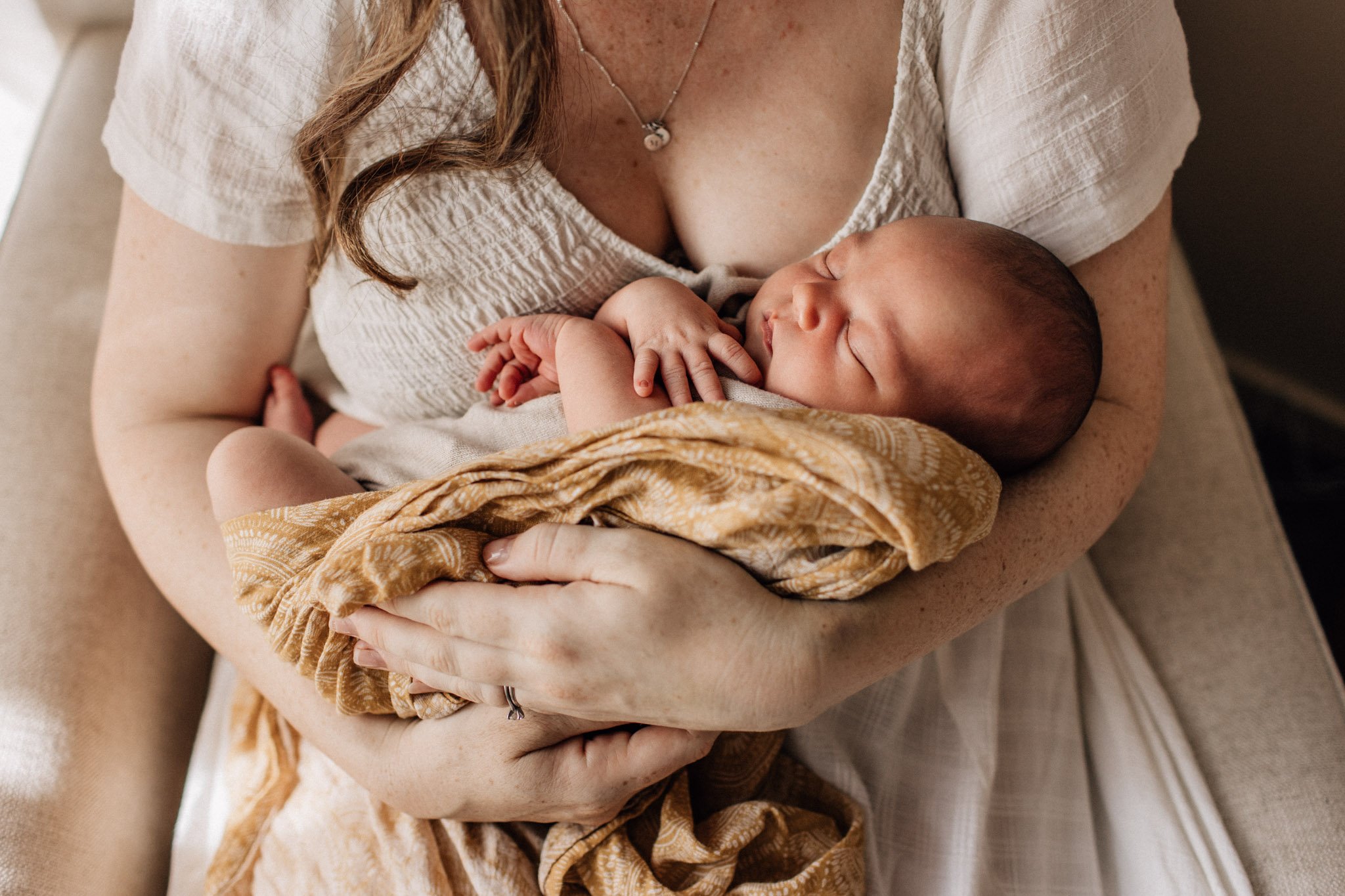 Geelong newborn baby cradled in mother's arms.jpg