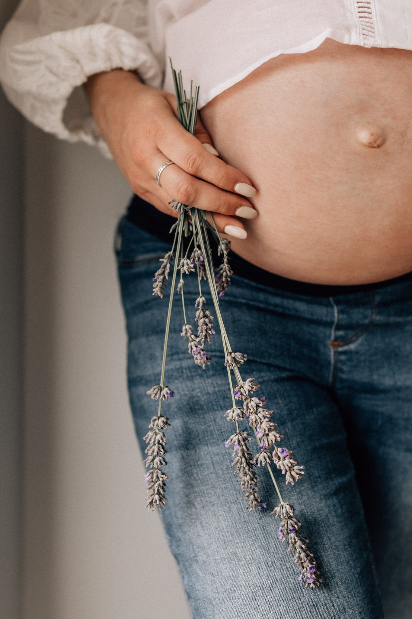 Nine month pregnant bump with dried lavender .jpg