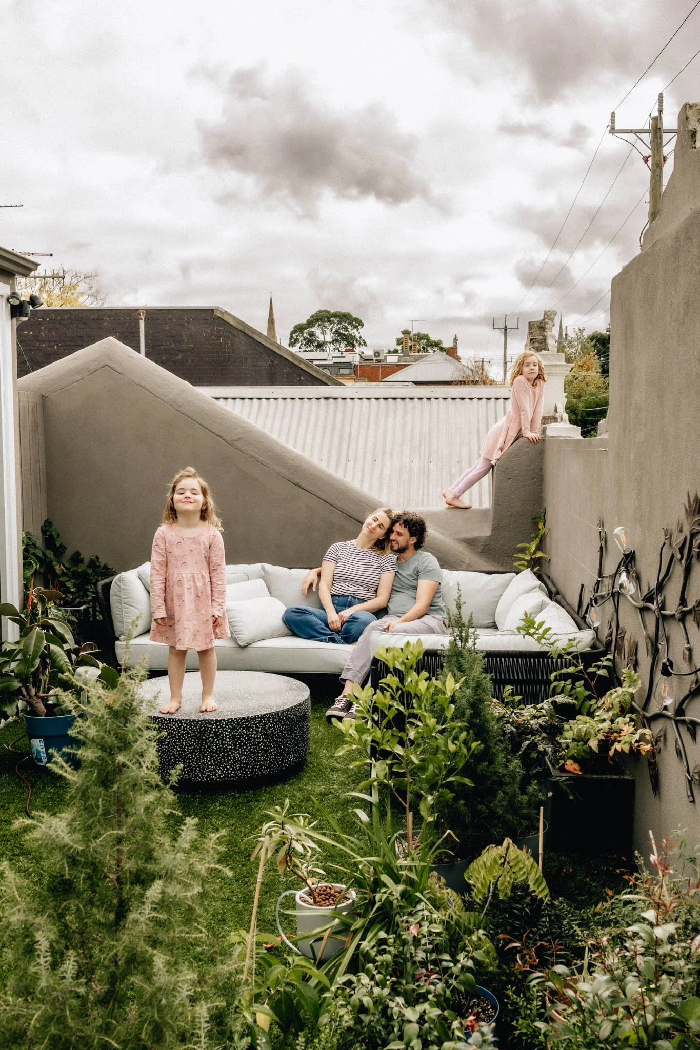geelong family posing on rooftop