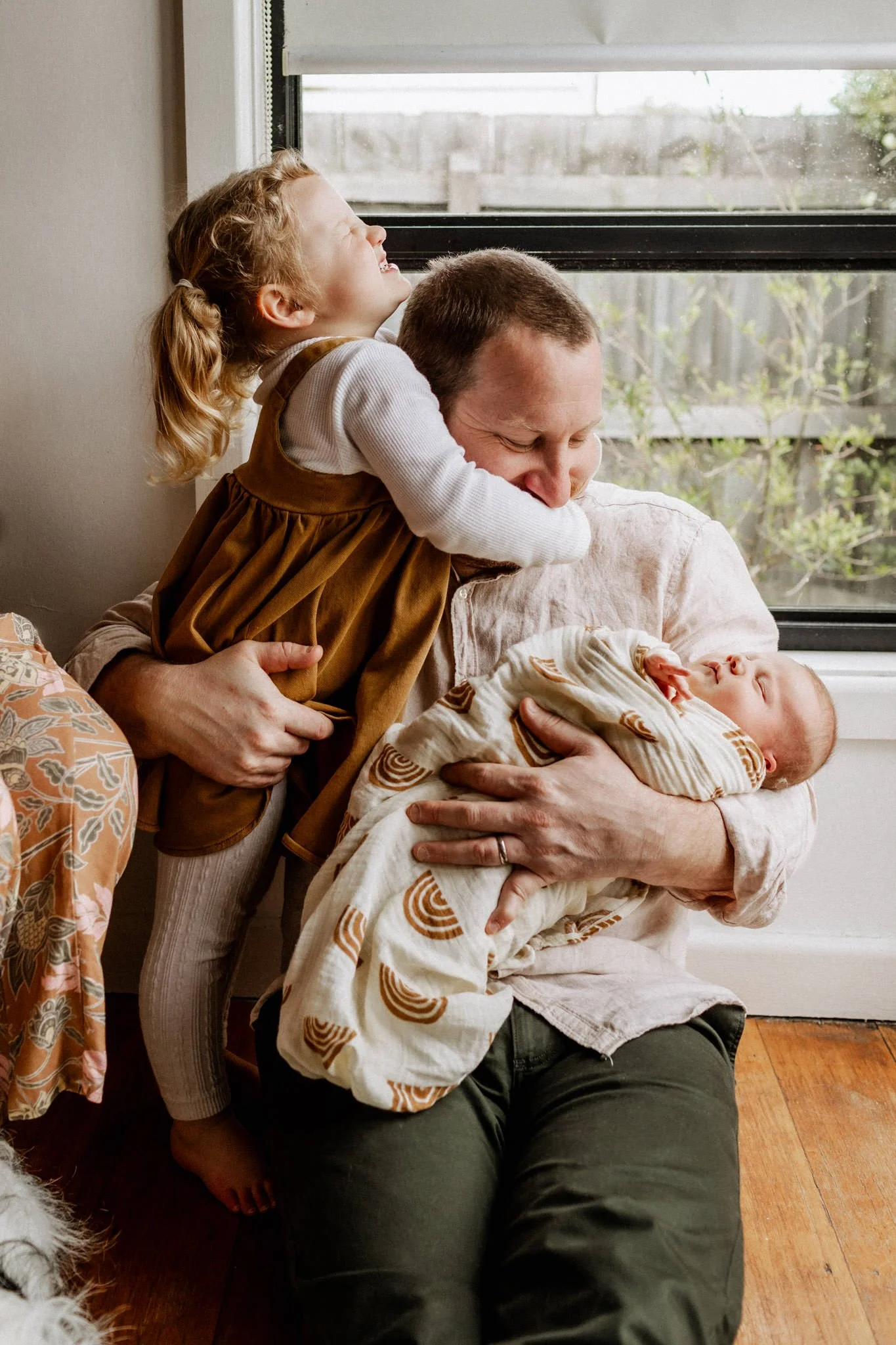 dad and newborn with toddler.jpg