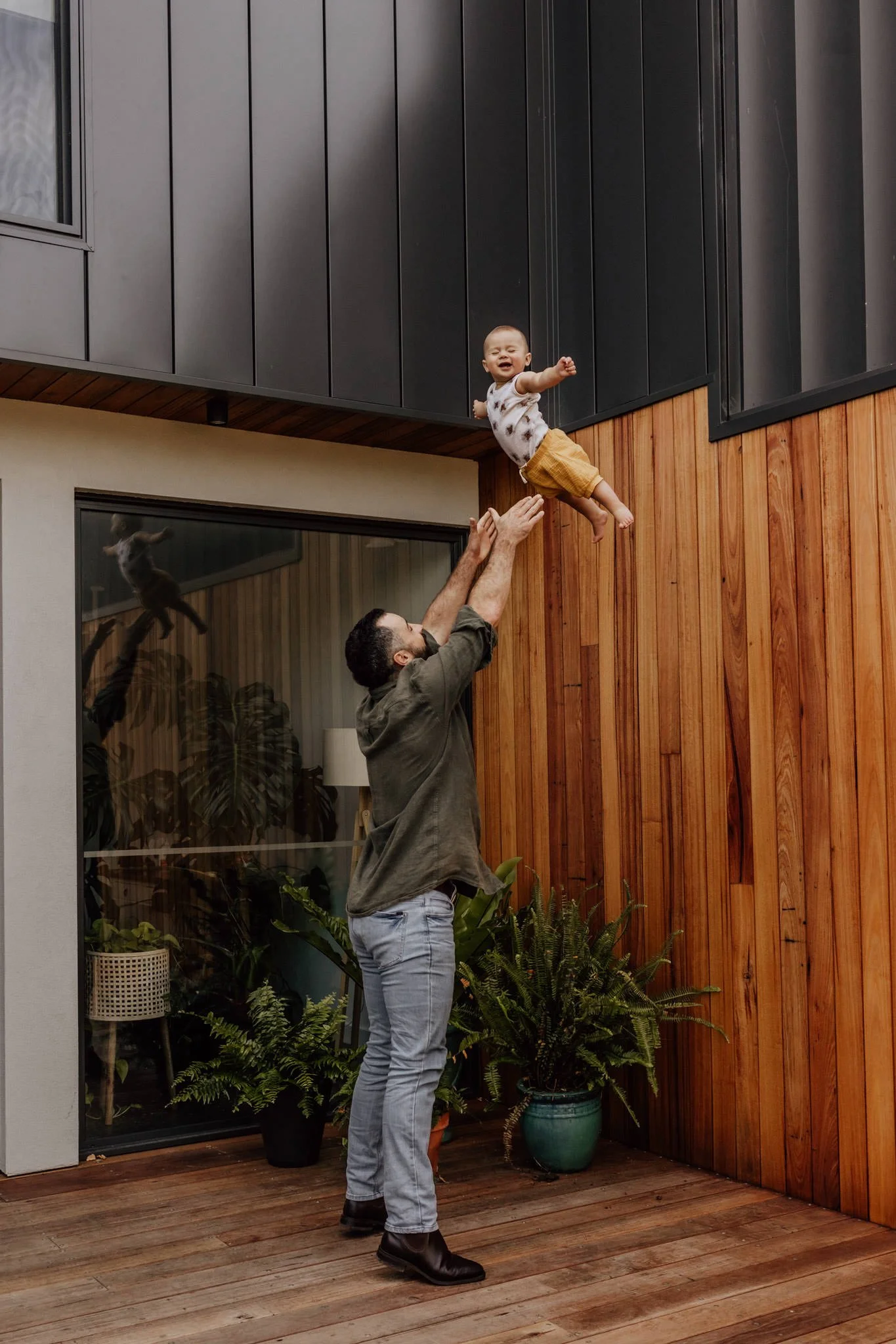 geelong father throwing son up in the air.jpg