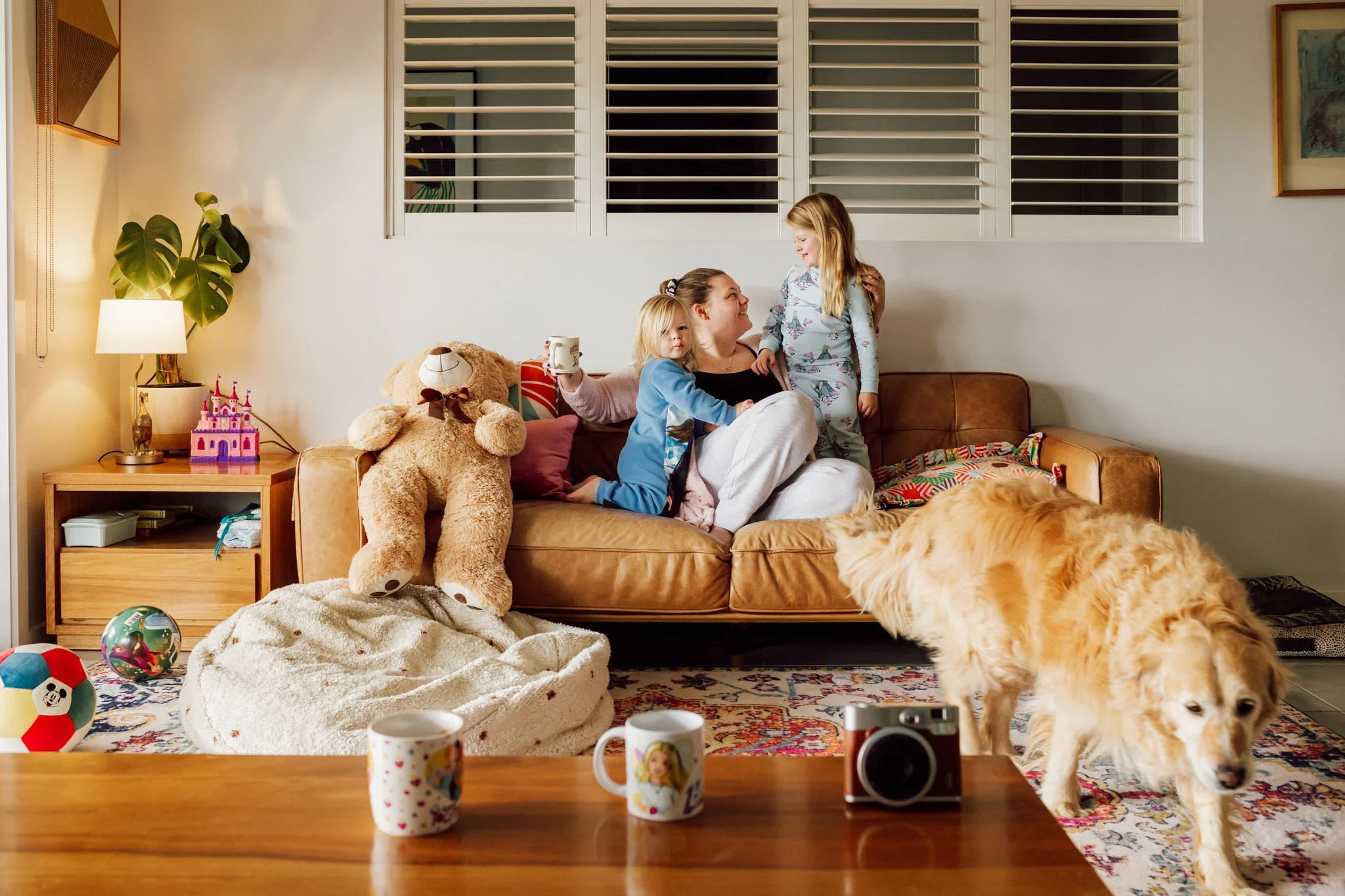 family lounging comfortably on sofa.jpg