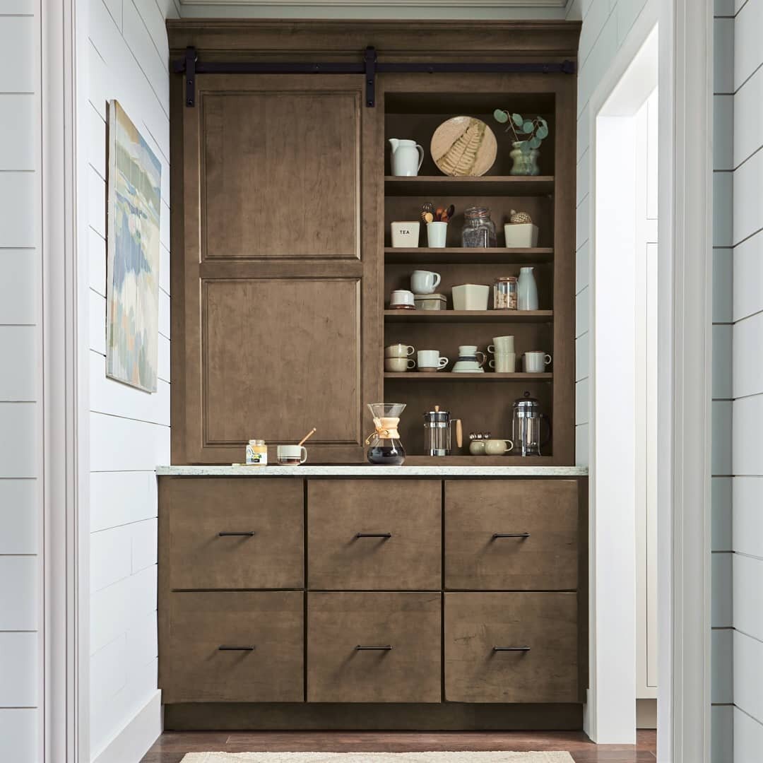 I am always on the lookout for opportunities to add functional storage to a home. A butlers pantry, mudroom or the end of a hallway are ideal spots for built in cabinetry. And it looks so much better than a closet door. Features like the sliding door