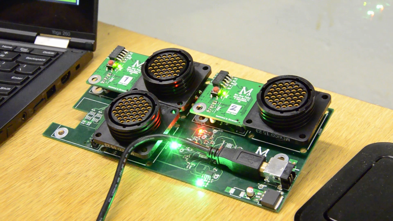 Assembly of the arm backplane, which contains microcontrollers and motor drivers.