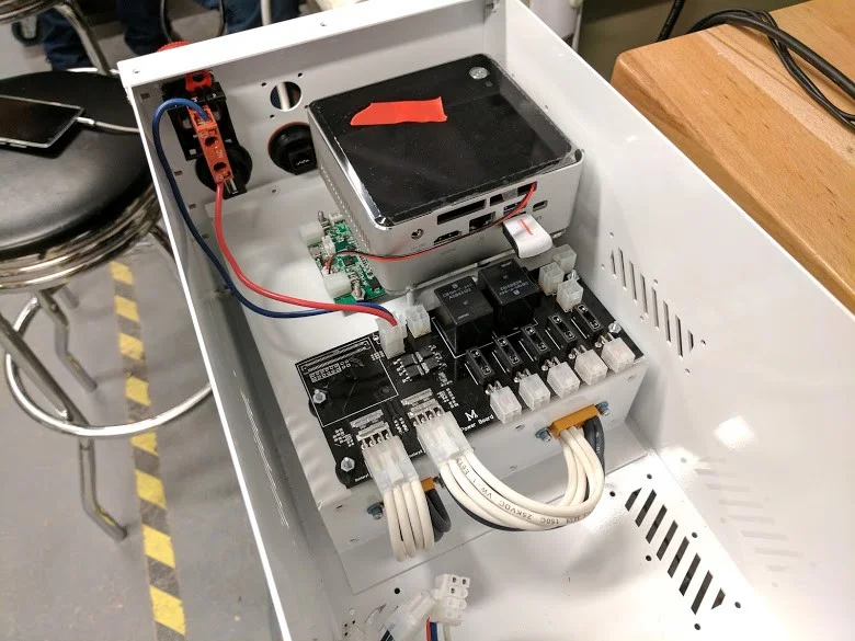 Assembly of the power system and computer in the main electrical box.
