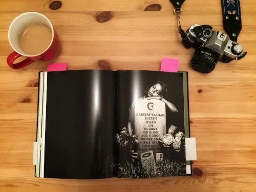 This is definitely one of my favorite images in the whole book. The mum cradling her sons headstone is heartfelt and sad, its one of the last images in the book and for good reason. It leaves you with a very somber feeling and I'm sure that is what Platon wanted as the last images are all of this kind. not only that but this has a very political side to it too as if you look at the headstone you will see the symbol of Islam which people in america thinks represents evil yet here you have a Muslim who gave there life for that country.Colin Powell used this Image as a refference in a public speech about this issue.