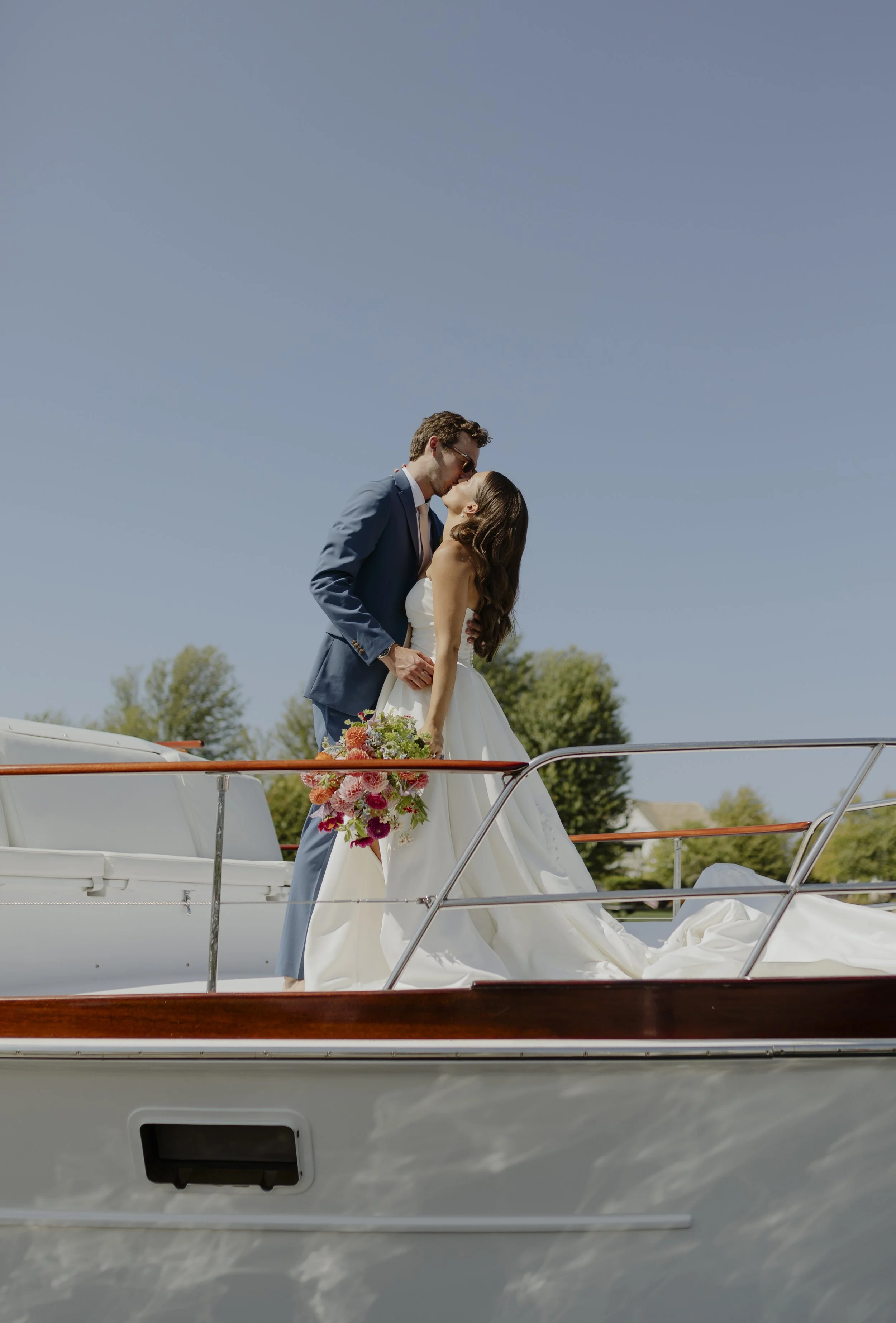 michigan wedding photographer, bride and groom portraits, northern Michigan bay harbor wedding, boat wedding photos, summer wedding, wedding photo inspo