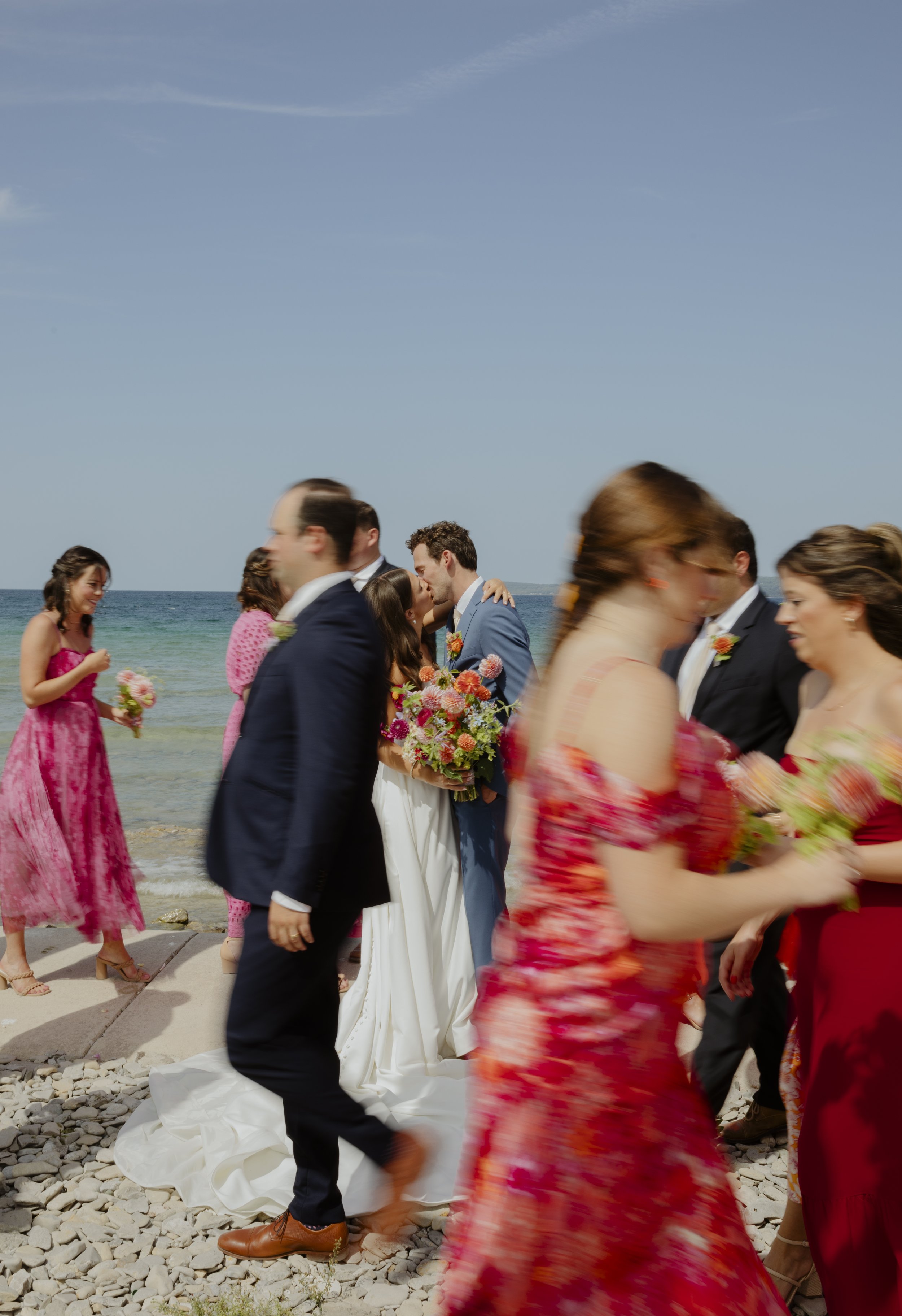 michigan wedding photographer, northern michigan wedding photographer, bridal party photos, unique bridal party photos, colorful wedding inspo, summer wedding, Michigan wedding