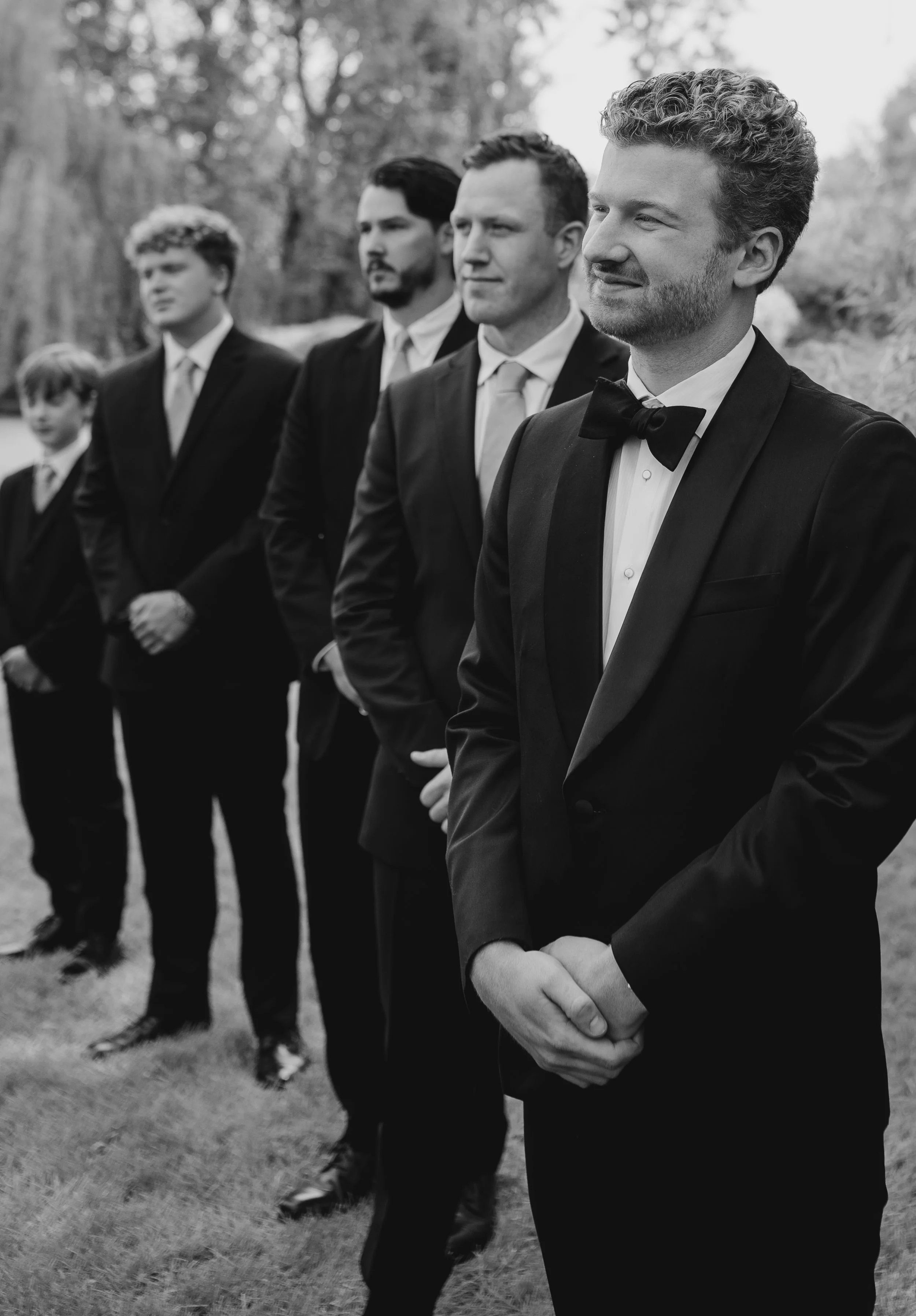 groom portrait, wedding ceremony photos, black and white wedding photos, documentary wedding photos