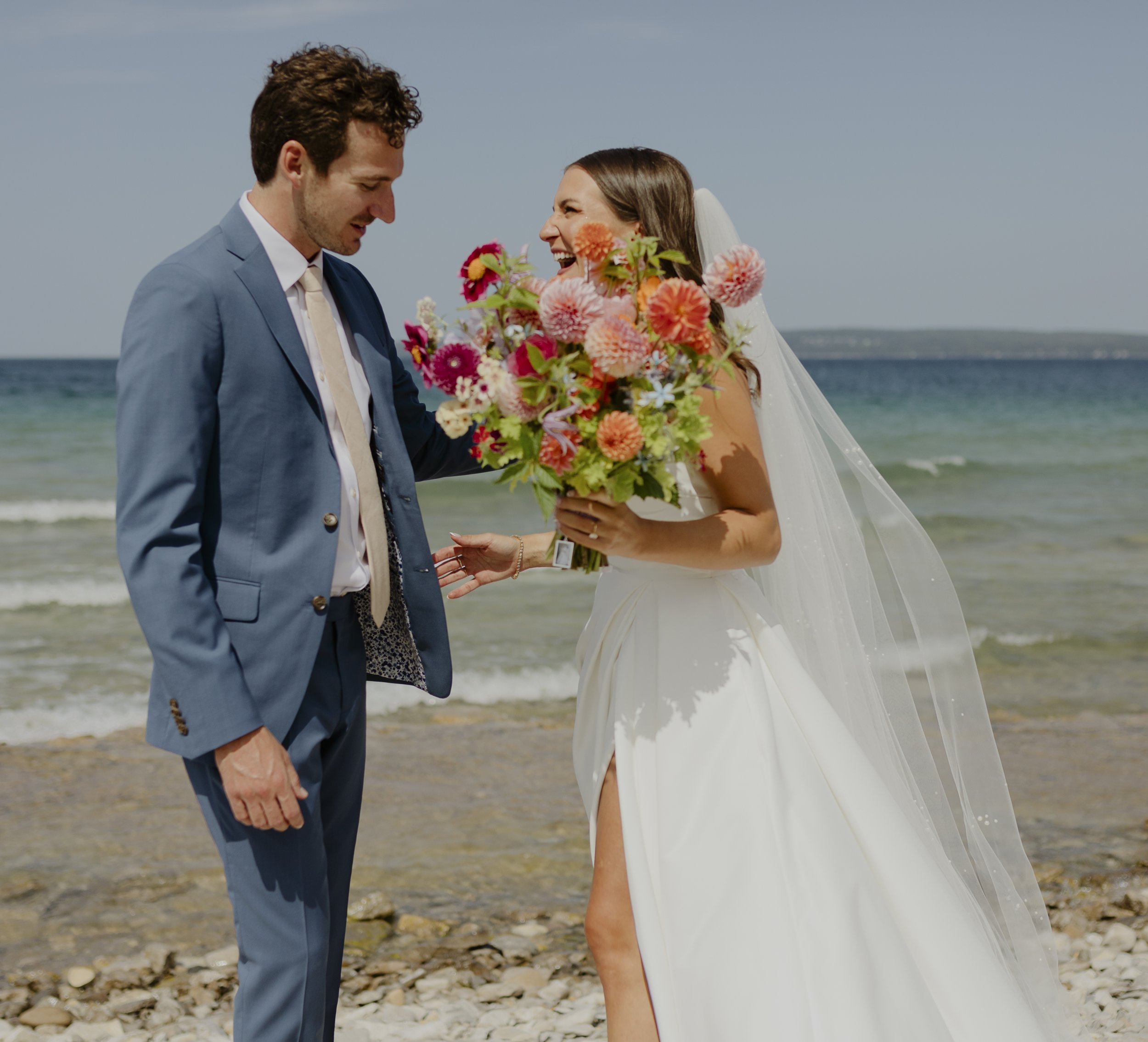 michigan wedding photographer, northern Michigan wedding photographer, documentary wedding photographer, first look photos, summer wedding, colorful bridal bouquet, colorful wedding flowers