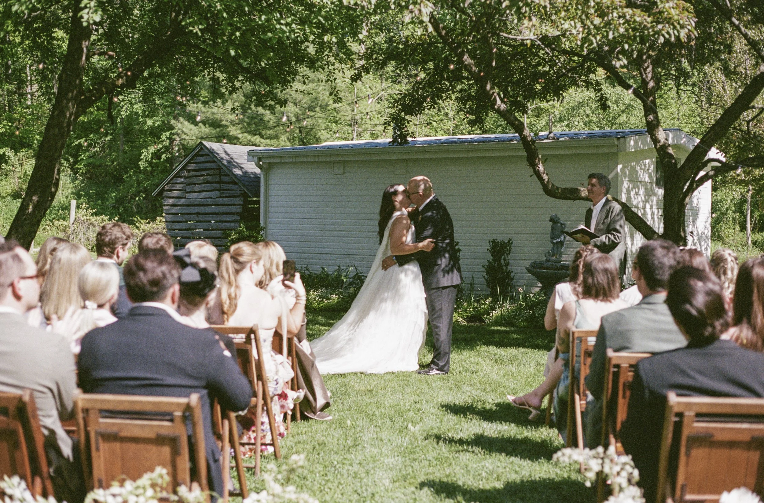 film wedding photographer, wedding ceremony, michigan spring wedding