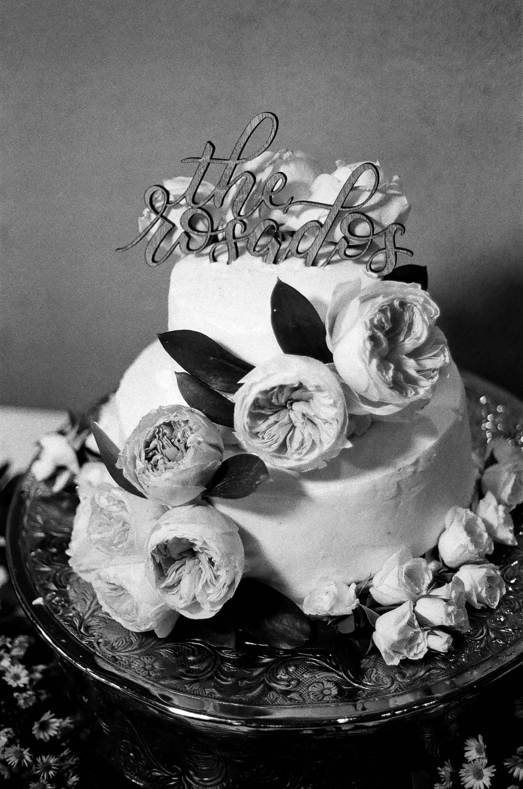 black and white 35mm film Photograph of Wedding cake taken by Joseph Barber wedding photography newport beach