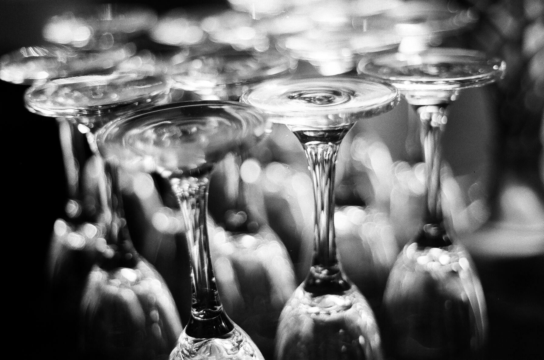 black and white 35mm film Macro Photograph of Polish Champagne glasses  taken by Joseph Barber wedding photography newport beach