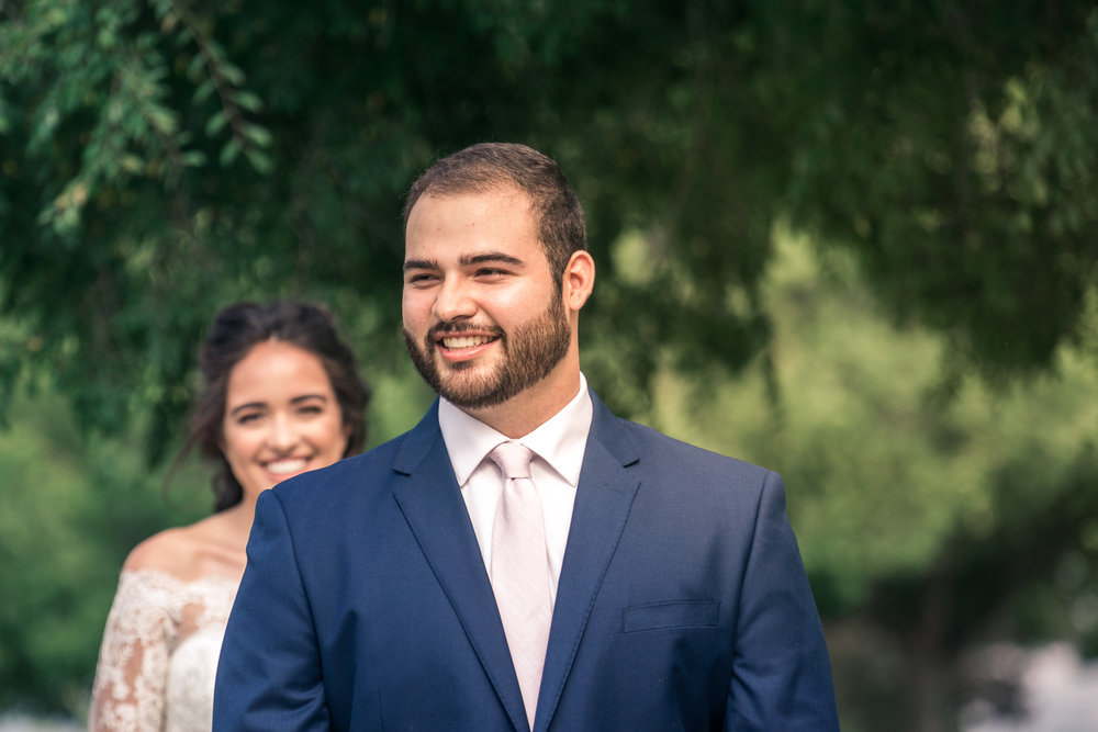 Portrait of groom waiting and  Anticipating His bride On their wedding day for the first look in Brea California