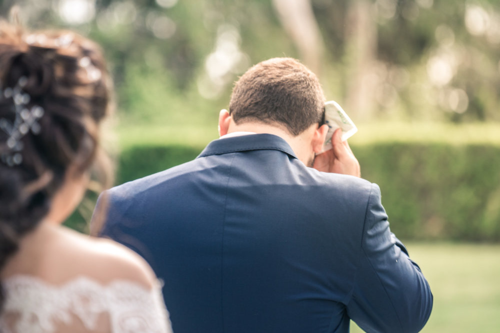 Portrait of groom waiting and  Anticipating His bride On their wedding day for the first look in Brea California