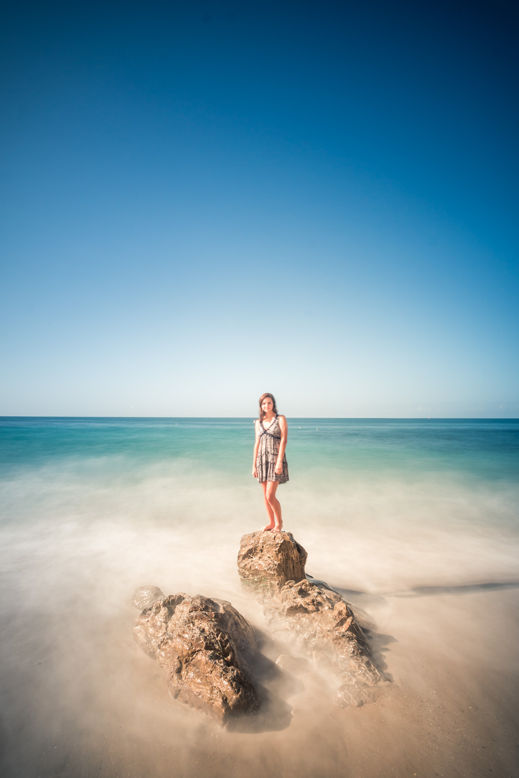 Artistic landscape and long exposure Graduation portrait session at Little Corona Beach