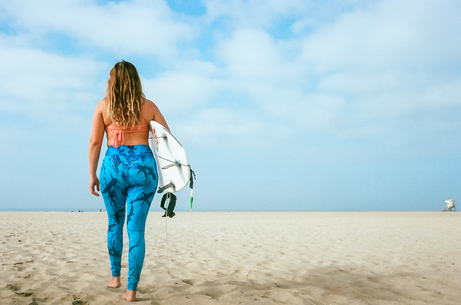 35mm color film Surfing photo shoot at Huntington State Beach with girl surfer for Get wise fool eco-friendly surf company
