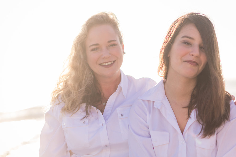 Family portraits  Of mother and daughter being back during Golden hour at Crystal Cove State Beach in Newport