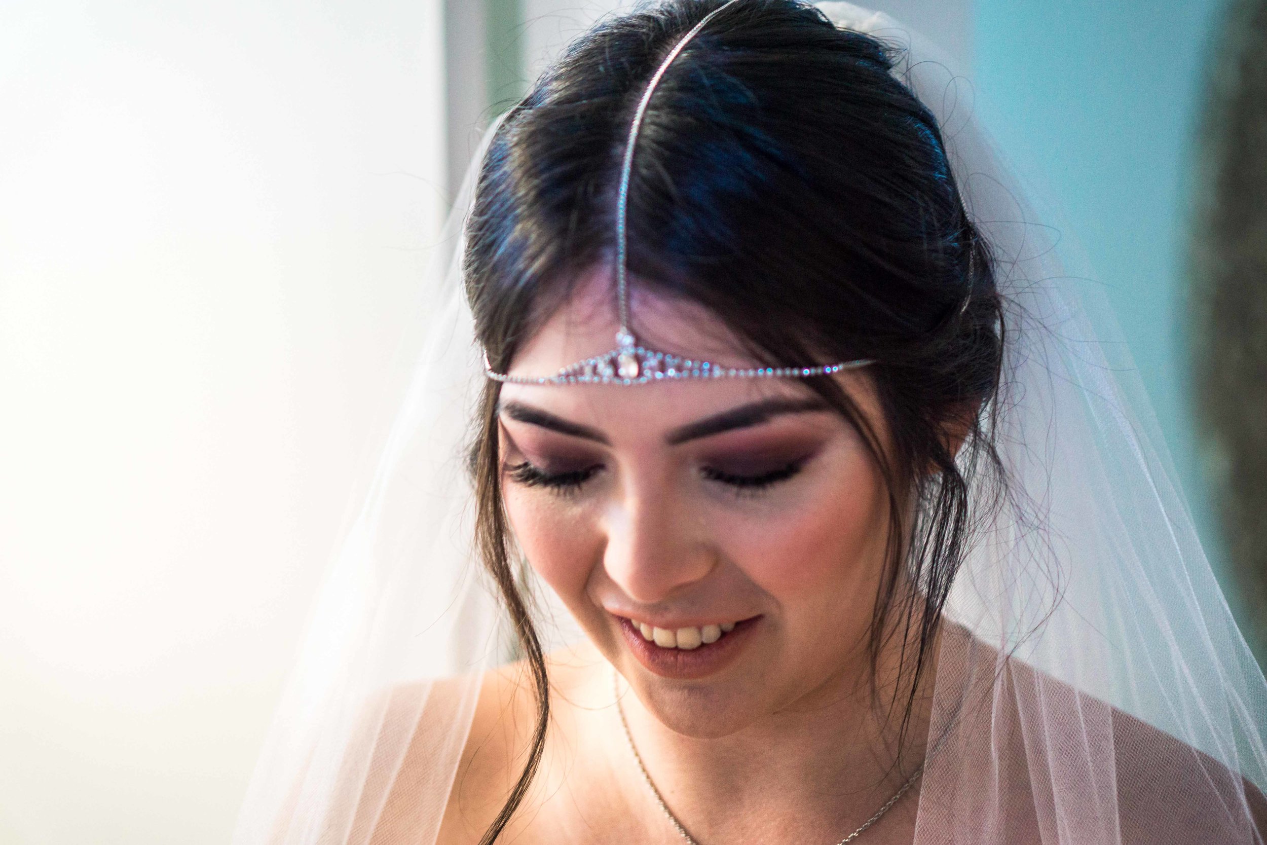 Bride with her veil headdress before the ceremony