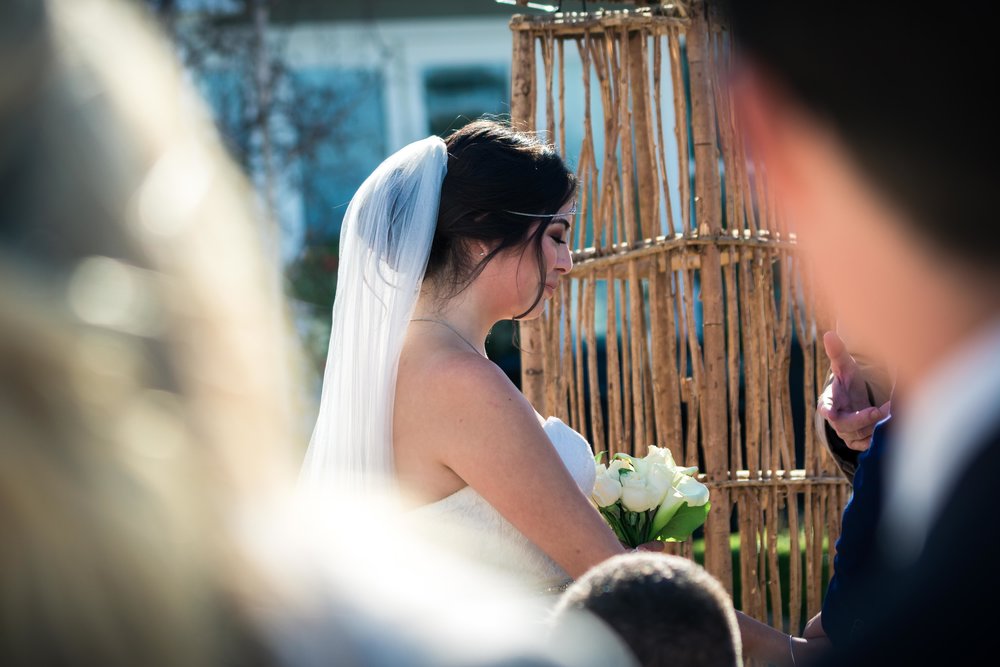 The bride at the altar at Her Balboa Island wedding