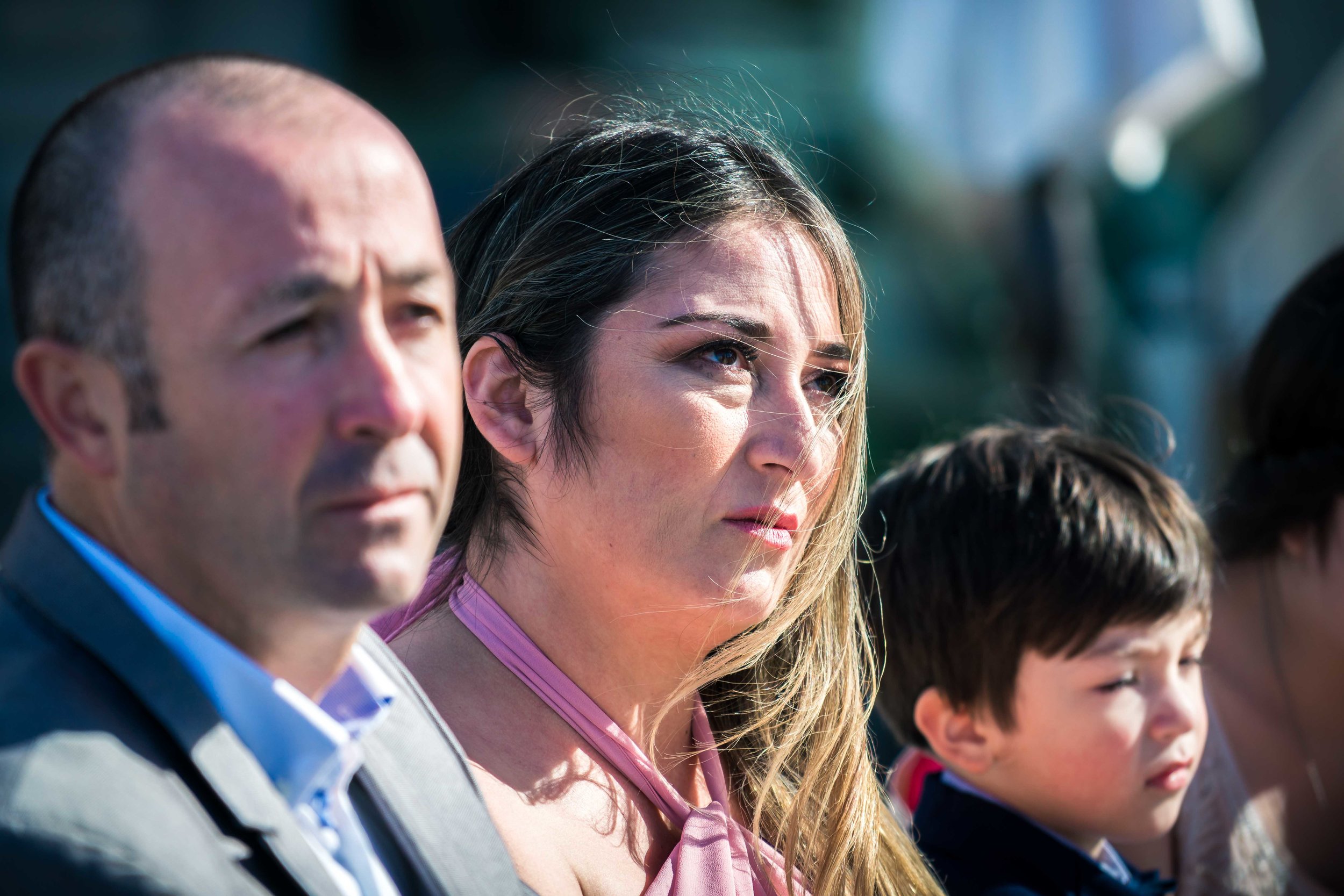 The bride's mother and father looking on much emotion during the wedding ceremony vows