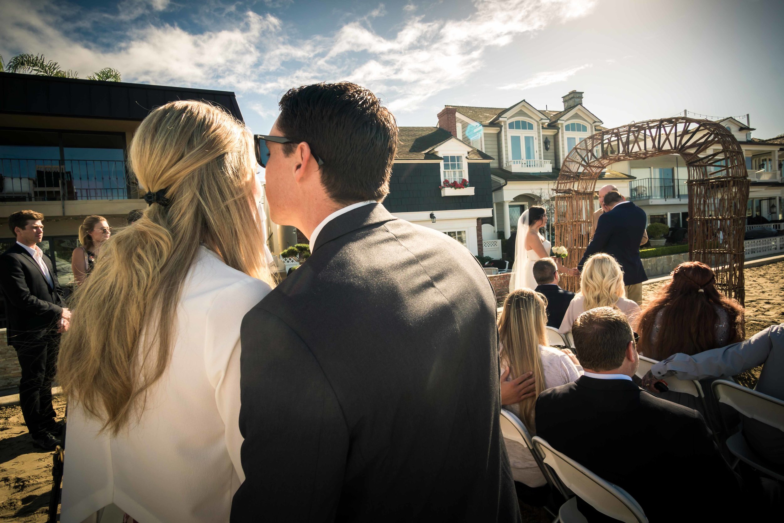 Wedding guest kissing at the wedding reception