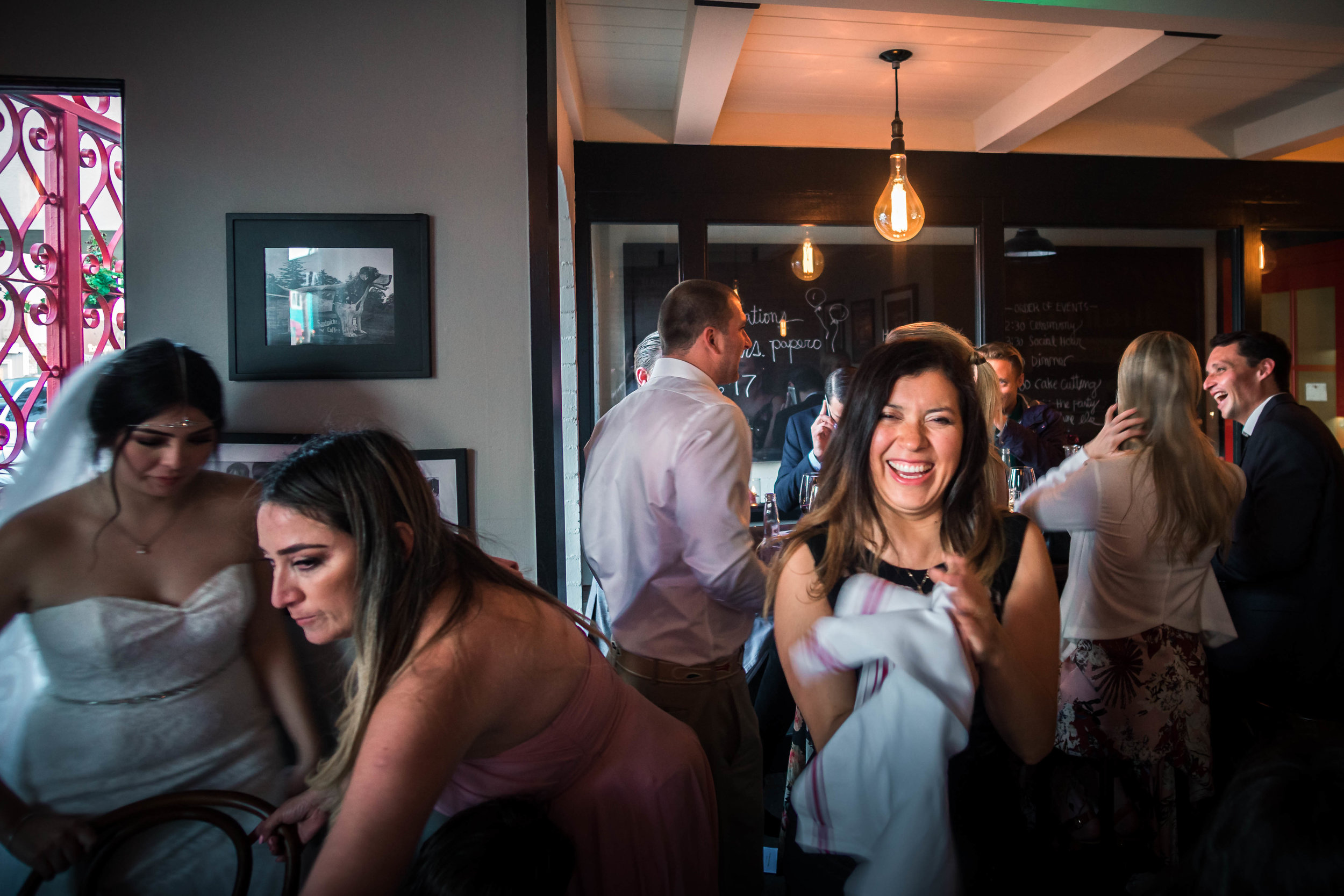 a wedding guest Laughing