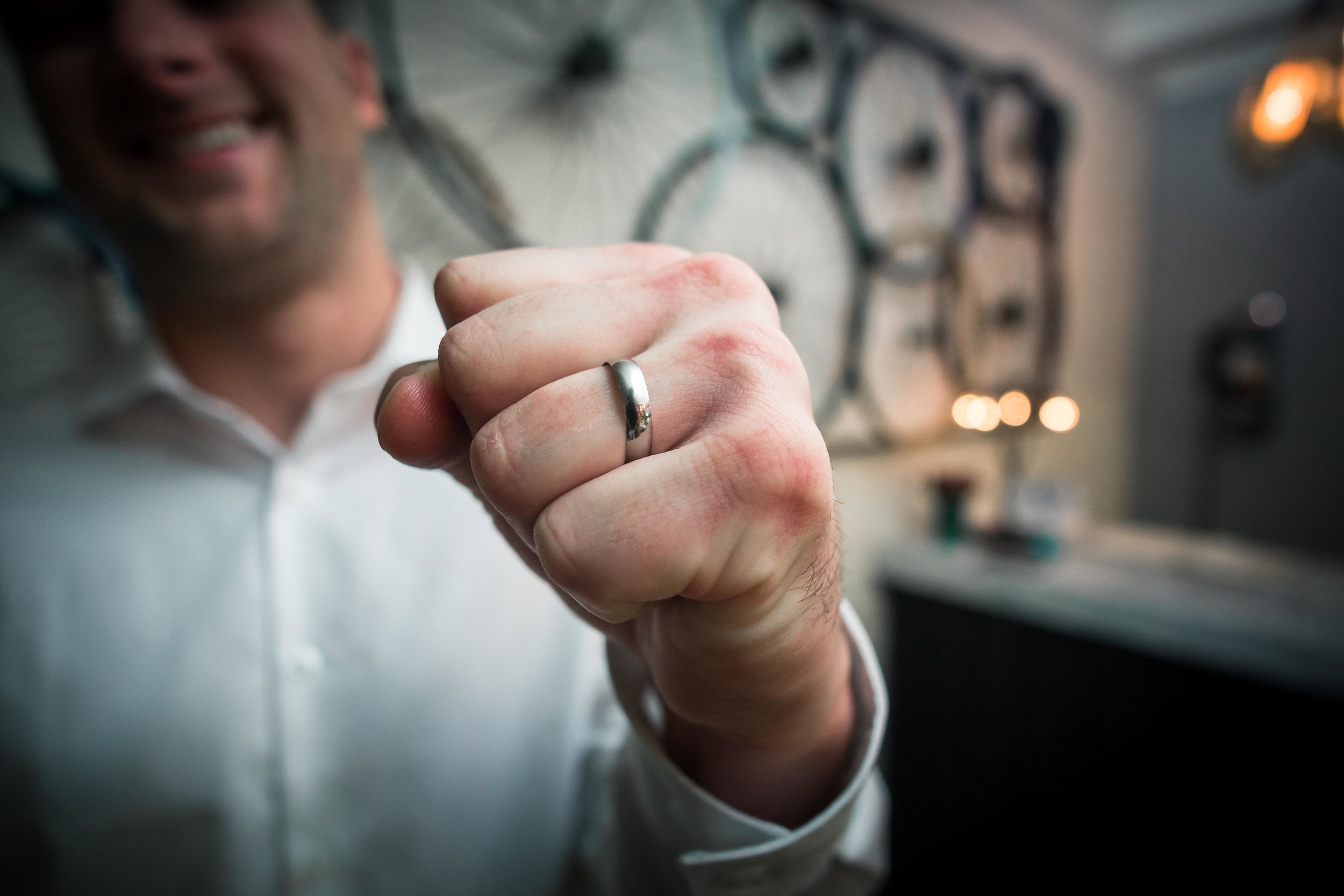 The Room showing off his wedding ring