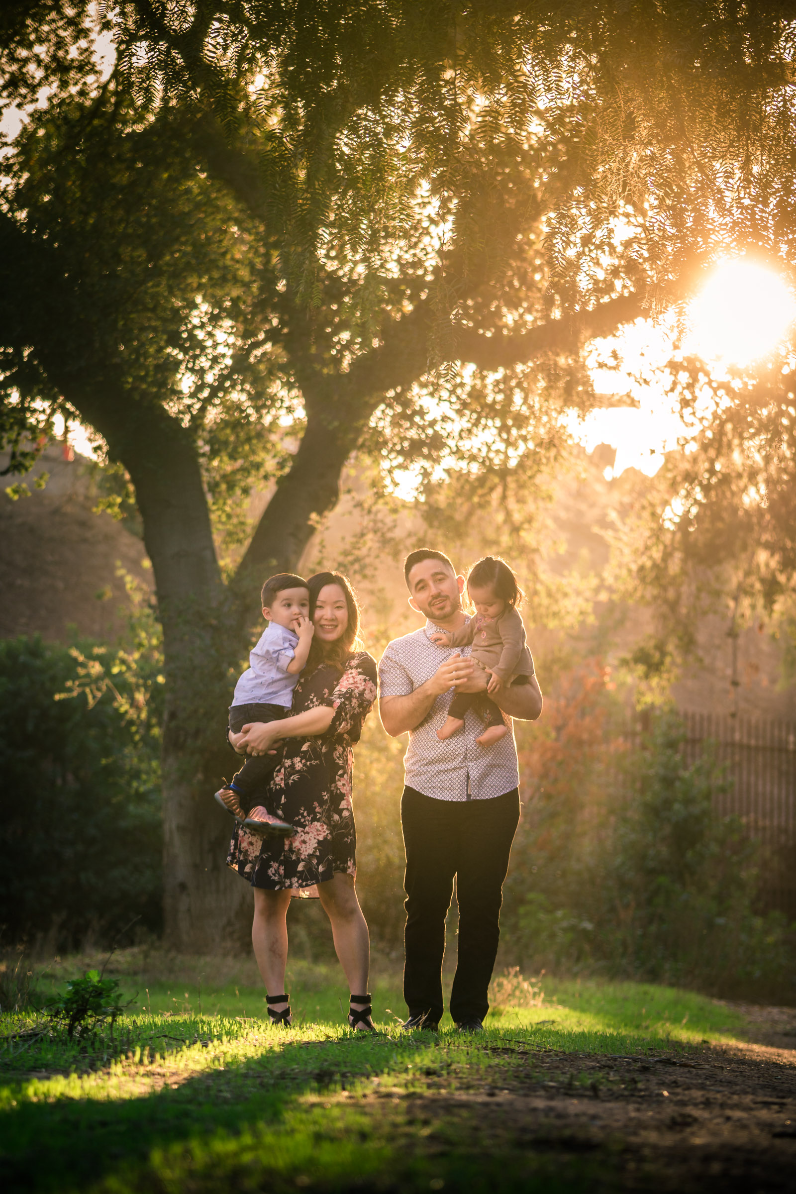 Candid family portrait of a family walking on the one Juanita Cooke trail in Fullerton during golden hour Taken by Joseph Barber photography