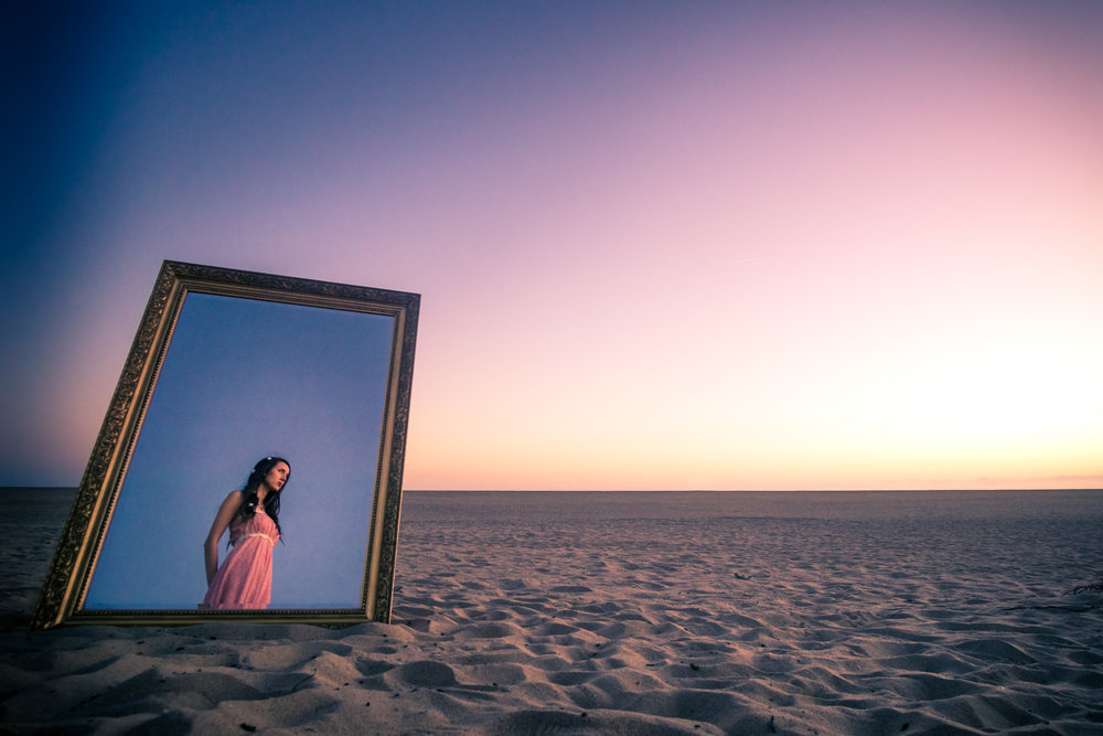 Fine art portraiture withe a vintage mirror on Balboa Island in Newport Beach California By Joseph Barber photography