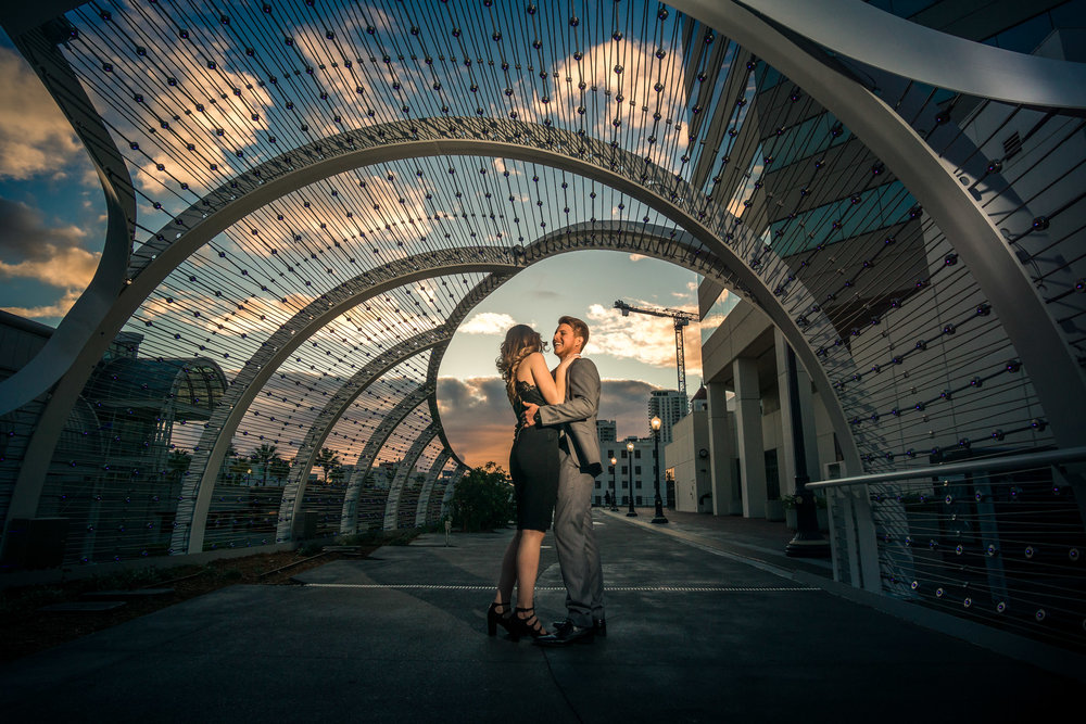 The Long Beach convention centers new rainbow Bridge Framing a couple kissing