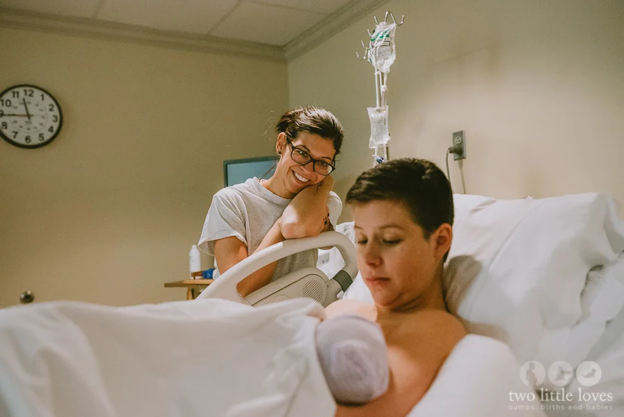 I love this photo of Stacy looking at sweet little Cade.