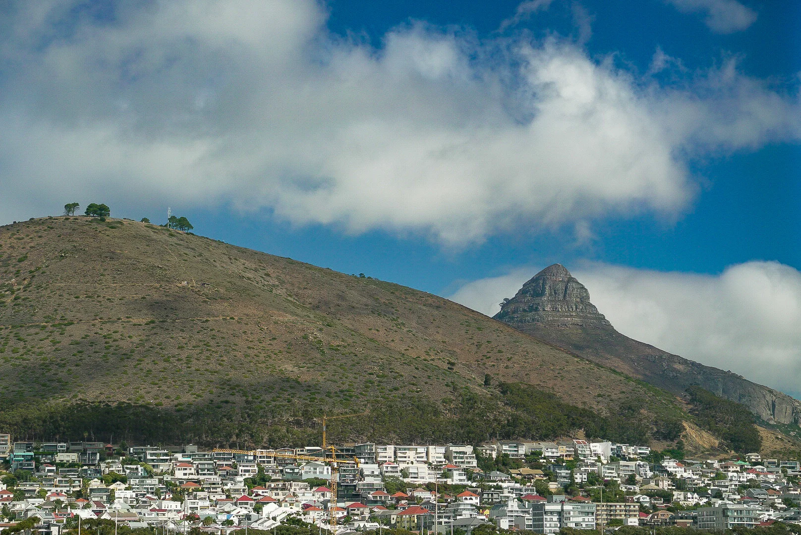 The view out our AirBnB window. The rocky point is Lions head and the hill to the left is Signal Hill
